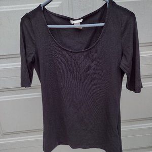 An "H&M" brand black shirt